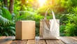 © andre - Eco-Friendly Packaging Sustainable Shopping Bag and Cardboard Box on Wooden Table in Nature