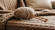 © Kanurism - Cozy Knitting Scene With Yarn and Needles on Textured Blanket Soft Lighting