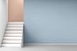 © nur - Minimalist stairs with blue and peach accent wall