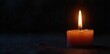 © chaiwat - Close-up of a single, flickering candle flame against a dark background, creating a warm, inviting ambiance Perfect for meditation, relaxation, or spiritual themes , ritual, energy, warm
