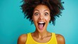 © sambath - A woman with an afro hairstyle, wearing a yellow tank top, is standing against a blue background with a surprised expression on her face.