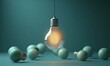 © btiger - A glowing light bulb hanging illuminated above several unlit light bulbs lying on a smooth teal surface, symbolizing creativity and innovation