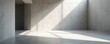© Maryna - Spacious room with gray concrete walls bathed in sunlight. Sunlight streams through room casting shadows. Creates minimalist elegant setting. Ideal background for product presentation stylish