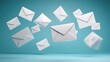 © Chotijah - Many white envelopes float in a light blue space.
