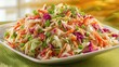 © Formoney - A colorful salad with a variety of vegetables including carrots, celery, and onions. The salad is served on a white plate and is arranged in a visually appealing manner
