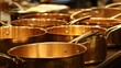 © MikhailAiman - Close View of Copper Cooking Pots with Shiny Handles