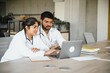 © Serhii - University, education, medicine, anatomy concept. Multiracial indian medical students in classroom, studying