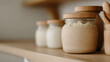 © A2Z AI  - Creamy delights captured in glass jars with wooden lids, displayed on a shelf. A serene and organic composition, highlighting homemade goodness and rustic charm.