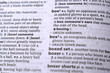 © BlueMistFilmStudios - English Definition Dictionary Page Close Up Of Printed Word Of -Box