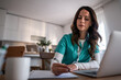 © Migma_Agency - Female healthcare professional studying medicine at home