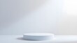 © Hi Alfan - Minimalist white cylinder podium on a clean studio background with a soft spotlight, perfect for product display and presentation