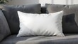 © Hi Alfan - Blank white cushion on a grey sofa, perfect for mockup and design presentation