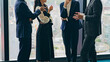 © metamorworks - business, conversation, teamwork, group, businessperson, people, colleague, conference, standing talk, meeting, discussion, debate, unity, japanese, asian, man, woman, indoors, lobby, lounge, no face,