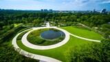 Aerial view of a beautiful park with a circular pond and lush green surroundings in the city
