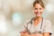 © whitestorm - Confident and Approachable Female Medical Professional Smiling with Stethoscope