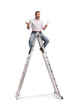 © Ljupco Smokovski - Man sitting on a tall ladder and holding a light bulb