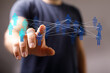 © vegefox.com - Hand touching digital network with human icons representing connection, global communication, teamwork, and collaboration. Illustrating business