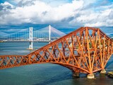 Forth Bridge from a drone, Queensferry Crossing, Forth Estuary, Scotland