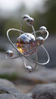 © Your Hand Please - atom model floating in soft mist, highlighting atomic structure, scientific exploration, and futuristic concepts, ideal for education, research, and tech themes