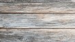 © Johannes - empty wooden painted grey gray table surface light colored wood texture background with copy space for text vintage planks with old natural pattern top view of desk from above close up no logos no br