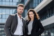 © Thanawat - Business couple wearing smart casual outfits, ideal for corporate advertising, office lifestyle, and modern branding.