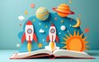 © bai - A colorful paper cutout illustration features science and math concepts like planets, a rocket ship, and a sun. It is placed on a book with a pencil, alluding to the start of the school year