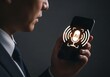 © Behram - Man using AI voice assistant on smartphone with virtual sound wave interface. Concept of artificial intelligence, speech recognition, smart technology, and hands-free digital interaction