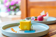 © TravelMedia - Elegant gourmet dessert on restaurant table with colorful presentation, featuring artistic plating and vibrant colors, perfect for fine dining, culinary arts, food styling themes.