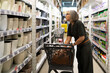 © Ivan Traimak - Shopping for home essentials in a well-stocked store aisle during the daytime
