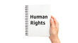 © Naruedetch - Human Rights Notebook Held by Hand on White Background