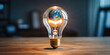 © AdliAqila - Glowing lightbulb contains a miniature Earth, symbolizing global innovation and sustainable energy solutions.