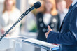 © Microgen - Male politician at press conference delivers a compelling vision, engaging media. His clear articulation ensures accurate reporting and builds public trust in policy matters.