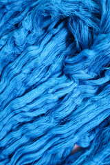  Natural cotton yarn. Hand-dyed skeins of yarn used for weaving. Handloom raw material.