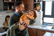 © NDABCREATIVITY - Happy loving daddy and affectionate boy playing, laughing having fun at home. Family leisure concept