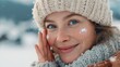 © LimeSky - Joyful attractive young woman applying winter skin protection