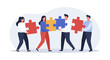 © vita_olivko - Diverse team collaborating to connect colorful puzzle pieces for successful project teamwork