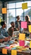 © Valentyna Prudnikova - Creative brainstorming session with colorful sticky notes, collaborative teamwork in modern office space exploring innovative ideas and strategies
