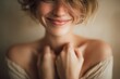© whitestorm - Close-up portrait of a beautiful young woman with freckles, fair skin and a radiant smile, showing natural beauty and a positive, cheerful emotion.