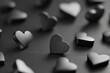 © ArtCookStudio - Small Black Heart Shapes Scattered on a Shiny Surface With Sparkles During a Creative Decor Session