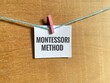 © Khairun - A single piece of white paper with the words Montessori Method. Refers to the Montessori Method of Education, an approach to learning and child development created by Maria Montessori.