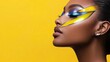 © Konstiantyn Zapylaie - Portrait of an african female with vibrant abstract makeup on yellow background