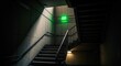 © Vodkaz - A well-lit staircase in a modern building leading to an emergency exit.