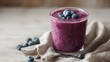 © Salander Studio - a vibrant purple smoothie garnished with blueberries