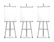 © marno - Three Blank Flip Charts on Tripods for Presentations.