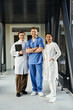 © LIGHTFIELD STUDIOS - Diverse doctors collaborating in a modern hospital setting