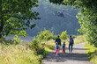 © Sergey Novikov - Family enjoy nature trail, helicopter fly above Howden reservoir