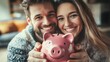 © hsantima - Couple enjoying savings with piggy bank.