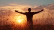 © backup_studio - Man standing in field with outstretched arms at sunset. Freedom, success, and spirituality concept. Nature background for mindfulness and well being.