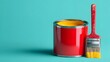 © irawan - Vivid red paint can sits beside a matching handled brush with bright yellow contents against a vibrant cyan background