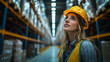 © plysuikvv - Woman with hardhat and vest looks up in warehouse setting Generative AI